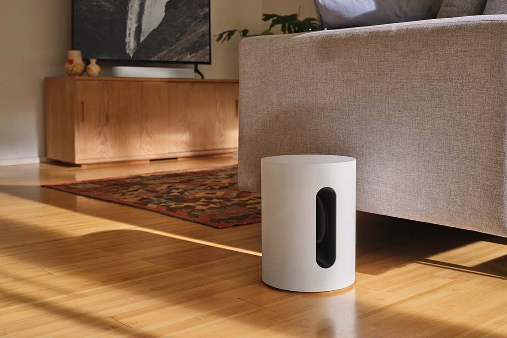 sonos sub speaker on wooden floor