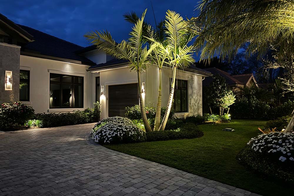 florida home in the evening with lights on