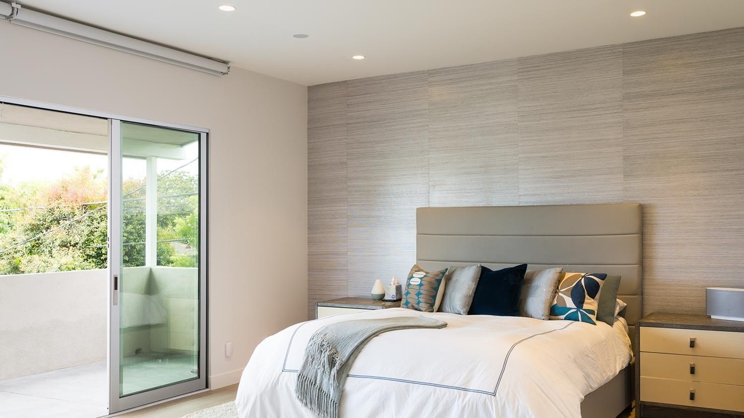 bedroom with ketra lighting and lutron shading