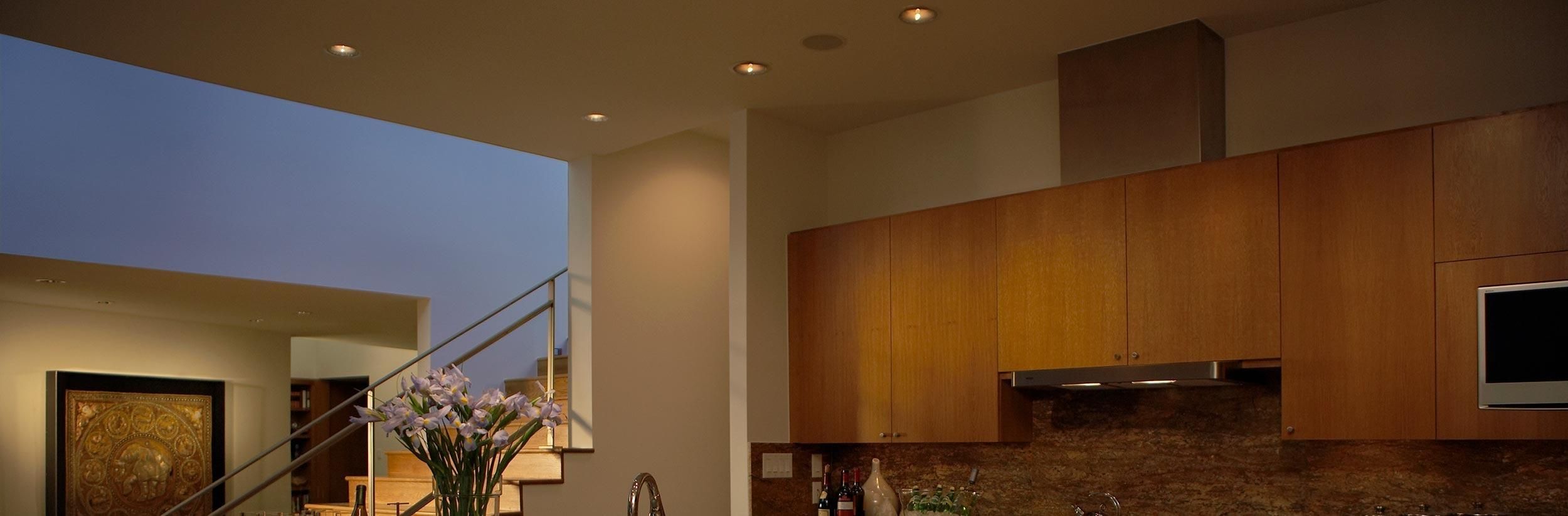 ceiling of an older home with retrofit lights