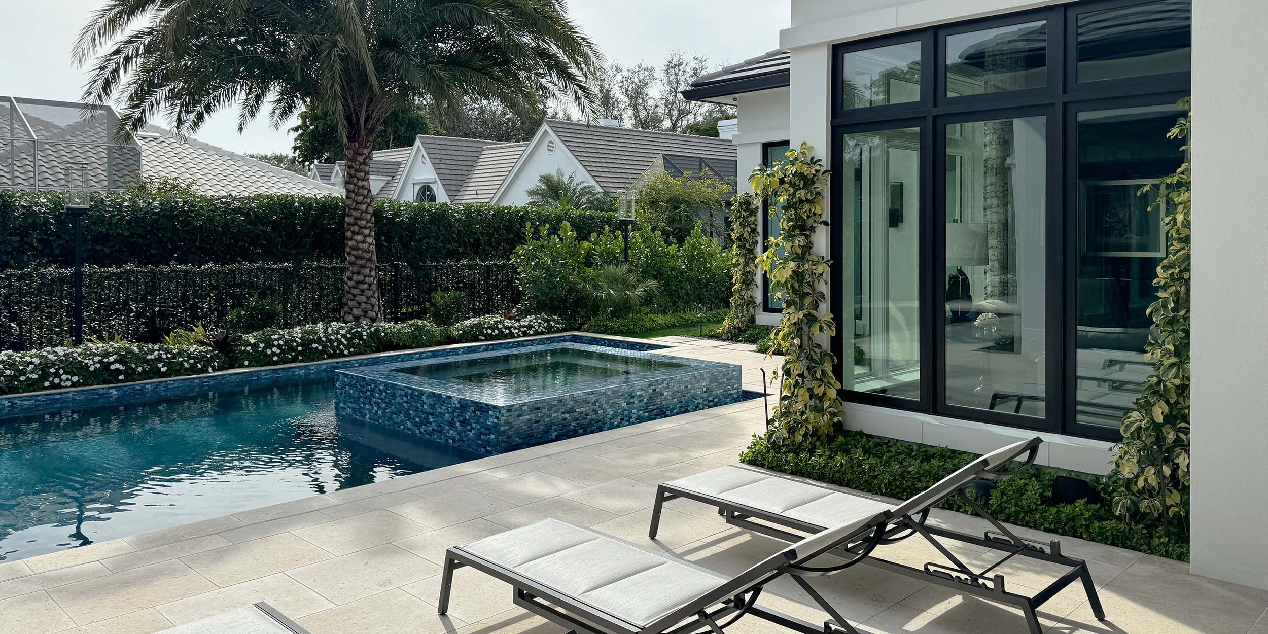 Florida home with a pool on a cloudy day